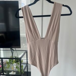 Pretty Little Things - plunge tan body suit